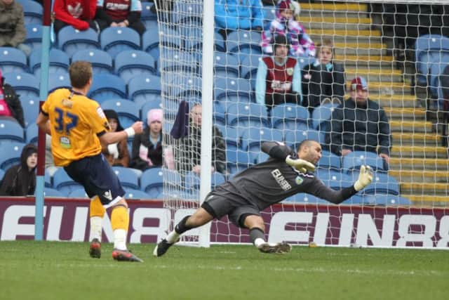 Harry Kane on loan with Millwall in 2012 beats Clarets keeper Lee Grant to score for the Lions