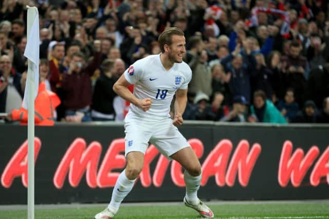 Harry Kane celebrates his England debut with a goal after just 79 seconds