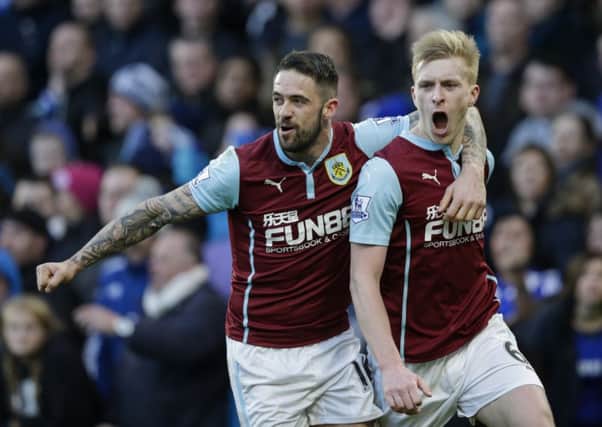 Ben Mee celebrates his equaliser at Chelsea with Danny Ings