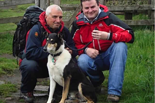 Finn and handler Stephen, with former Pendle MP Andrew Stephenson. (S)