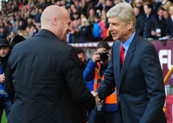 Sean Dyche greets Arsenal boss Arsene Wenger before kick off