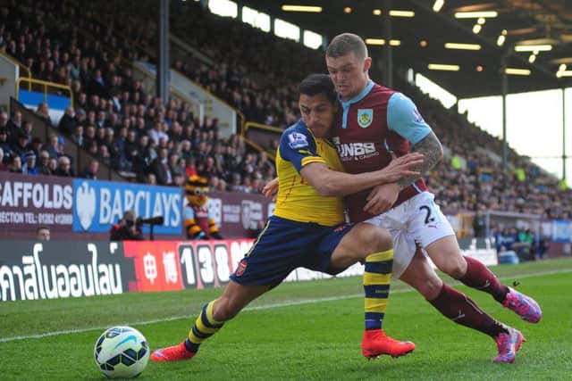 Kieran Trippier gets to grips with Arsenal's Alexis Sanchez