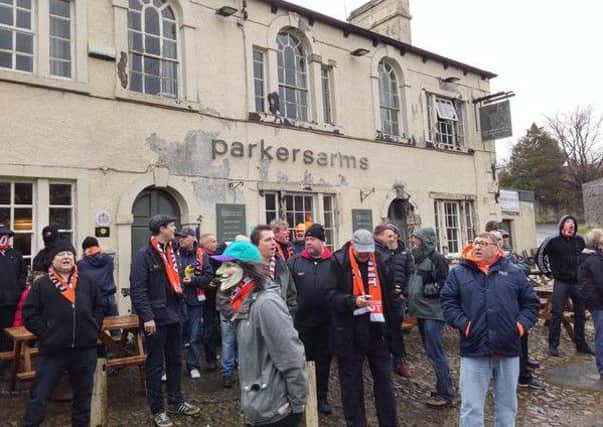 Blackpool fans protesting outside the Parkers Arms pub