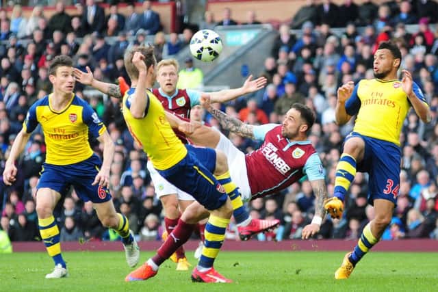 Danny Ings attempts a bicycle kick against Arsenal