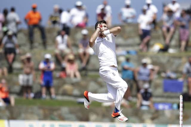 England's James Anderson bowls against West Indies during day three of their first cricket Test match at the Sir Vivian Richards Cricket Ground in Antigua, Antigua and Barbuda, Wednesday, April 15, 2015.  (AP Photo/Ricardo Mazalan)