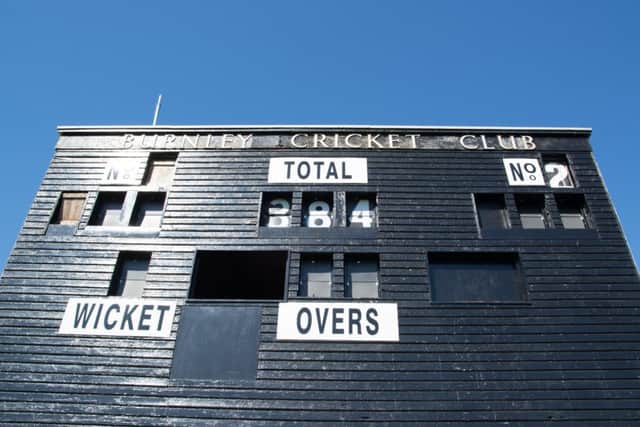 Burnley Cricket Club scoreboard shows 384 in recognition of Jimmy Anderson's record breaking English Test Wicket haul