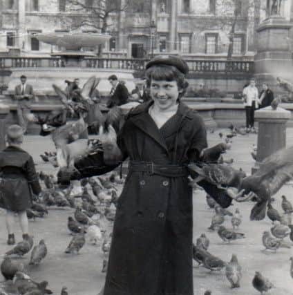 Margaret Lupton in Trafalgar Square before the 1958 Cup Final. (s)