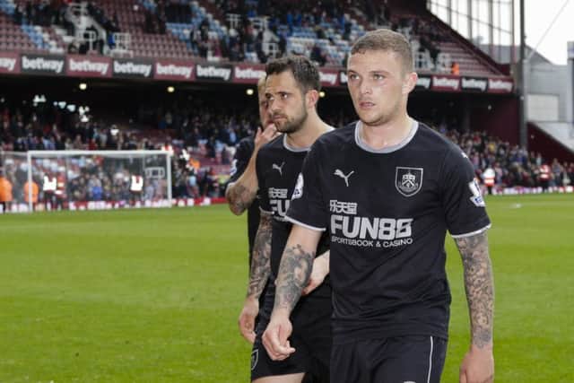 Kieran Trippier &  Danny Ings look dejected as they leave the pitch