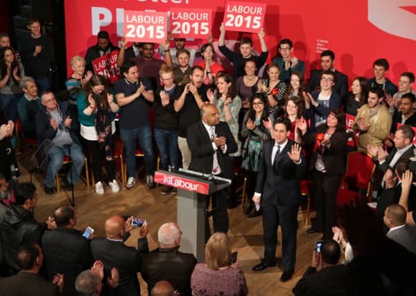 Labour leader Ed Miliband is welcomed on stage by Azhar Ali.