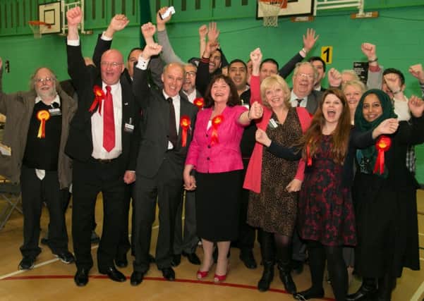 Julie Cooper celebrates her victory in the Burnley General Election.