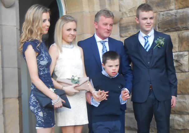 Vincent Parkinson with his dad James, brother Harry and sisters Florence and Nainsi before the wedding ceremony