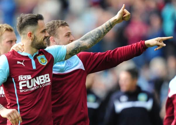 Burnley's Danny Ings, centre, and Burnley's Kieran Trippier applaud the fans as the team do a lap of appreciation after the game

Photographer Chris Vaughan/CameraSport

Football