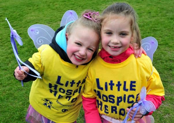 Photo: David Hurst
Little angels Ruby Brooks, left, and Abbie Graham take part in the Little Hospice Heroes Walk in Towneley Park, Burnley.
