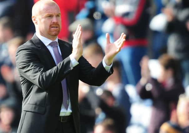 Burnley boss Sean Dyche thanks the fans at the final whistle against Stoke last weekend