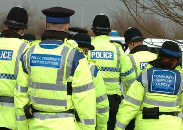 CUTS: The thin blue line is set to get thinner, Clive Grunshaw (inset) has warned