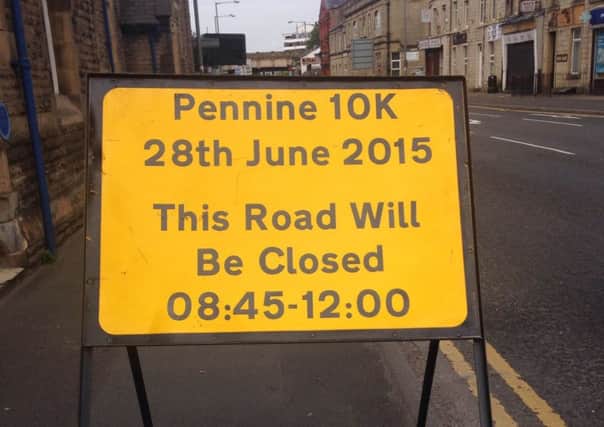 Road closed sign for the Pennine 10k event