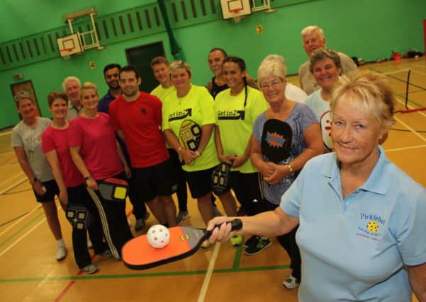 June Walker (right)  with newly-qualified pickleball instructors.