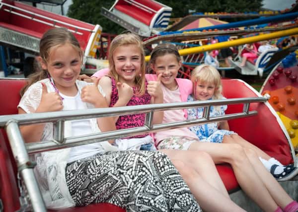 Burnley annual wakes fun fair at Fulledge Recreation Ground. Pictured: Hele Little (10), Holly Calamela (10), Charlie Gill (10) and Evie Broadley (5). Anthony Farran