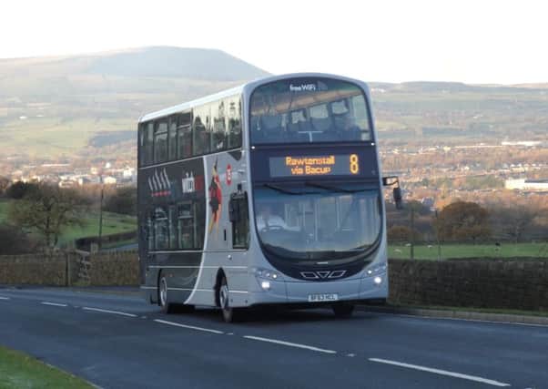 Witch Way bus with Pendle Hill in the background. By Mark Croasdale (s)