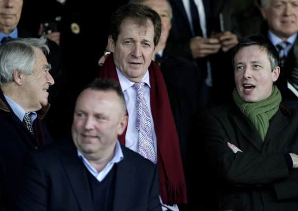 SPIN DOCTOR: Alastair Campbell, middle, attending a Burnley match at Yeovil last year