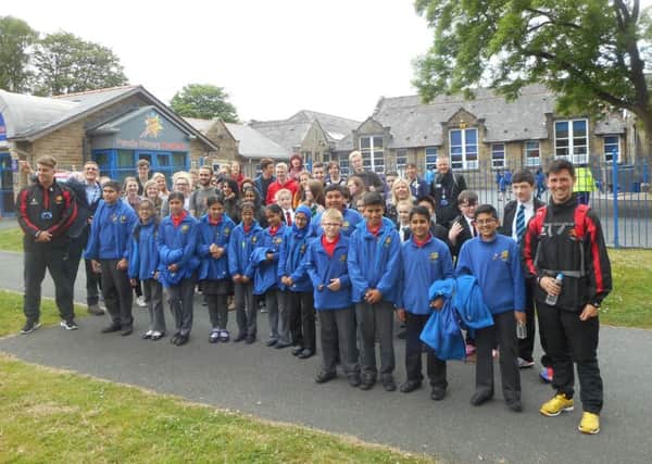 Pendle Primary Academy pupils get ready to walk on the final stretch back to Nelson and Colne College (S)