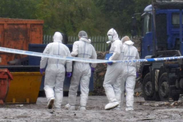 Forensics at the scene of the murder in Balderstone Lane, Burnley