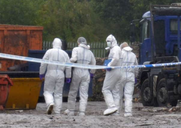 Forensics at the scene of the murder in Balderstone Lane, Burnley