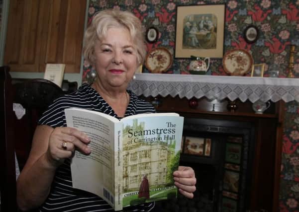 Author Christine Shuttleworth Milsteed at the Weavers Triangle Vistiors Centre with her new book 'The Seamstress of Carrington Hall'.