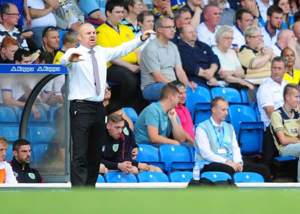 Sean Dyche shouts instructions to his team from the dug-out