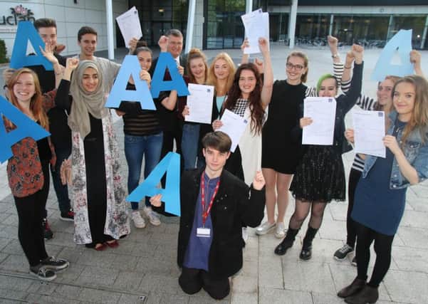 Burnley College students celebrate their success.
