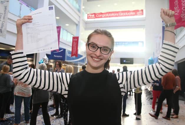 Burnley College student Annabel Moorhouse is all smiles with her 3 A's.
