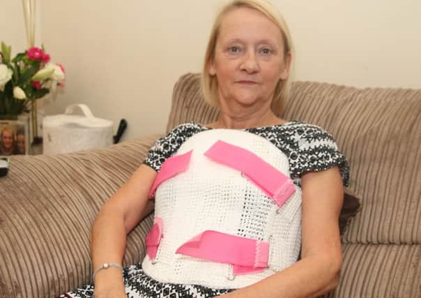 Janet Newham who is recovering from a broken back and is complaining about the lack of lights on the M65.