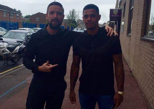 Andre Gray has been spotted outside Turf Moor with Clarets fan James McDonough - Photo: @claret_macca