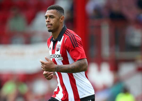 Signed: Andre Gray