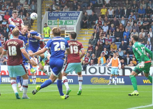 Michael Keane rises highest to put the Clarets in front