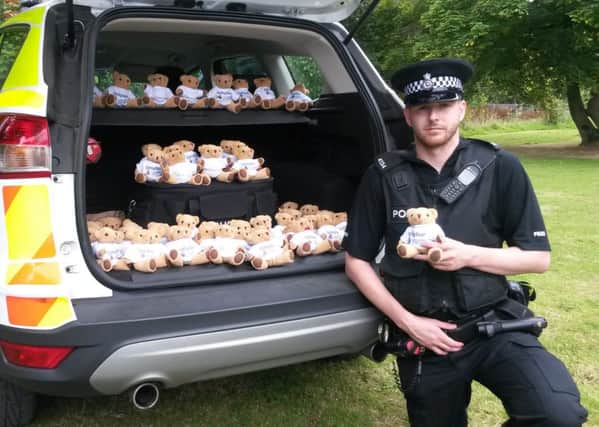 PC Simon Grounds with some of the teddies. (s)