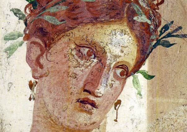 A fresco of a woman's face from Herculaneum which is usually on show at the Museo Archeologico Nazionale in Naples.
