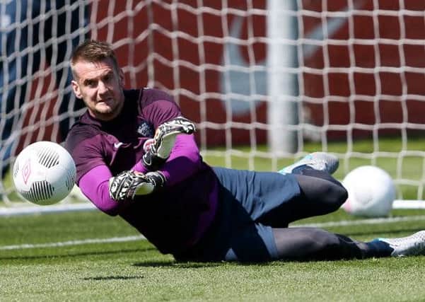 Tom Heaton during the training at St George's Park, Burton. PRESS ASSOCIATION Photo. Picture date: Thursday June 4, 2015. See PA story SOCCER England. Photo credit should read: David Davies/PA Wire. RESTRICTIONS: Use subject to FA restrictions. Editorial use only. Commercial use only with prior written consent of the FA. No editing except cropping. Call +44 (0)1158 447447 or see www.paphotos.com/info/ for full restrictions and further information.