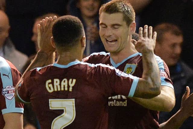 Sam Vokes in congratulated after putting the Clarets ahead