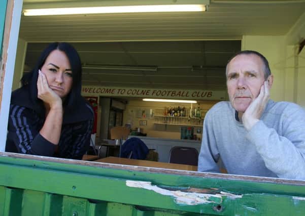 Louise Atherton and Dave Priestley survey the damage after the latest break-in at Holt House, the home of Colne Football Club.