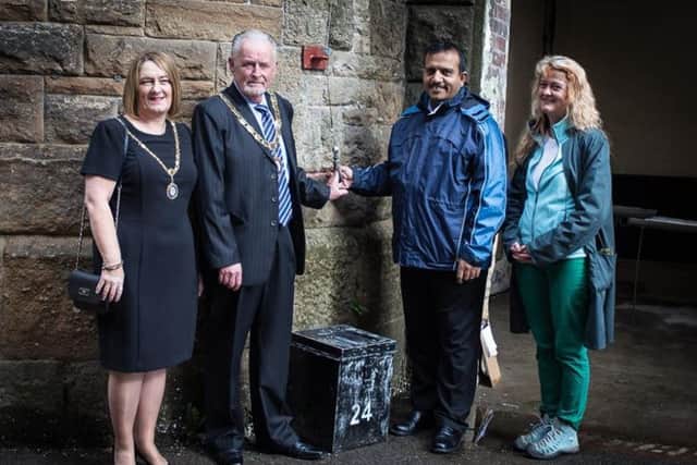 The Mayor of Brierfield Coun. David Brown and his wife Colette ring the bell at the Northlight Mill with Coun. Mohammed Iqbal, Lwader of Pendle Council and In-Situ artist Kerry Morrison (s)
