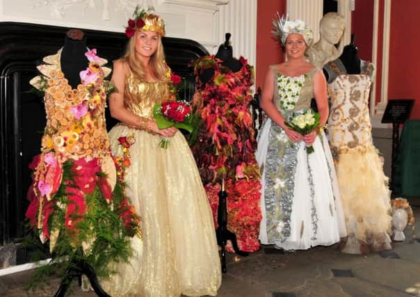 Photo: David Hurst
 Towneley Flower Festival held at Towneley Hall, Burnley. 
Floral models Hollie Gregory and Chloe Walker with a display by Ann Coulton