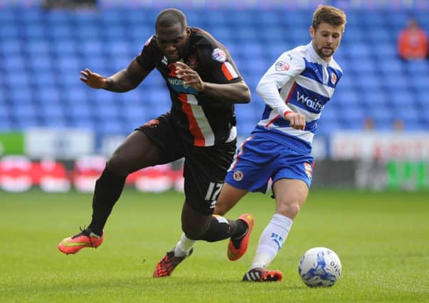 Oliver Norwood in action for Reading