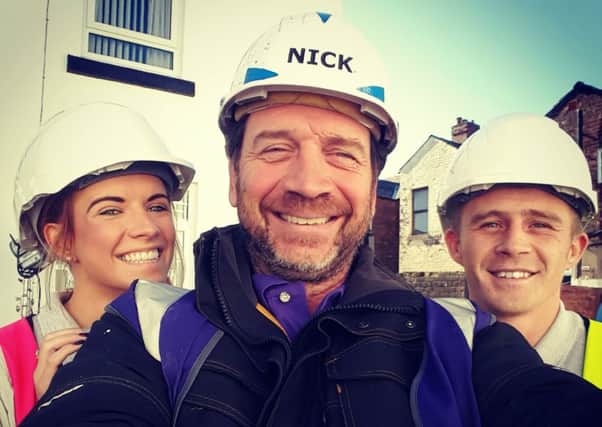 Nick Knowles from the BBC's DIY SOS show takes a selfie with Louise and Sean Warren-Beck from Colne company XGreen Clean. (S)