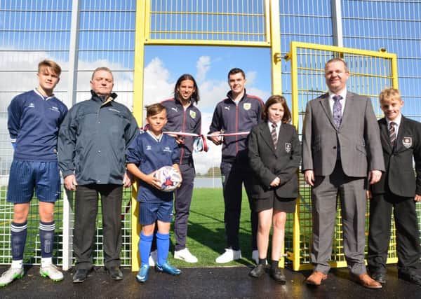 George Boyd and Michael Keane open West Craven's brand new all weather pitch. Photo: Kelvin Stuttard