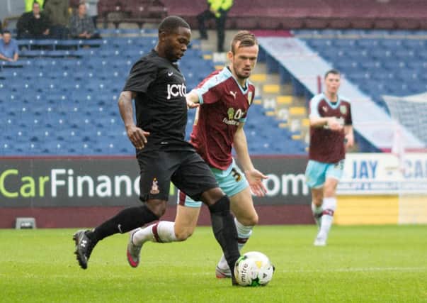Cameron Dummigan in pre-season action for the Clarets made his Oldham debut at the weekend