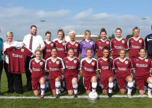 Burnley FC Ladies are presented with a new kit by their sponsors Optimus