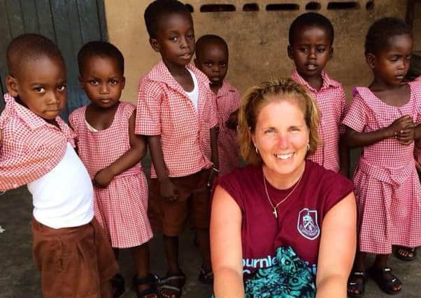Jane with some of the youngsters she and William met on their visit to Ghana last year.