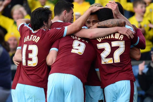 Andre Gray celebrates his first goal