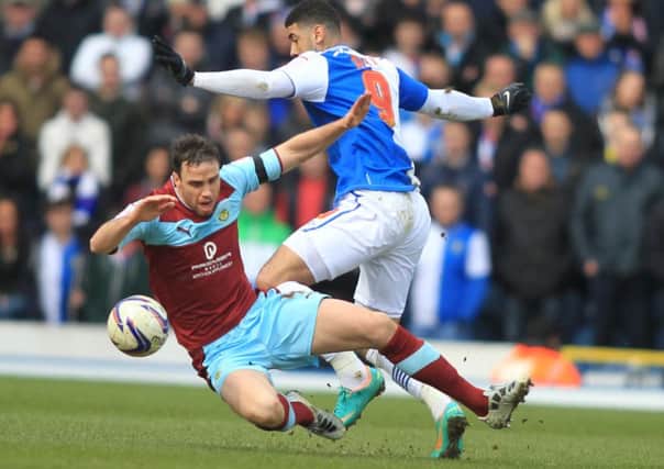Michael Duff battles with Leon Best in 2013